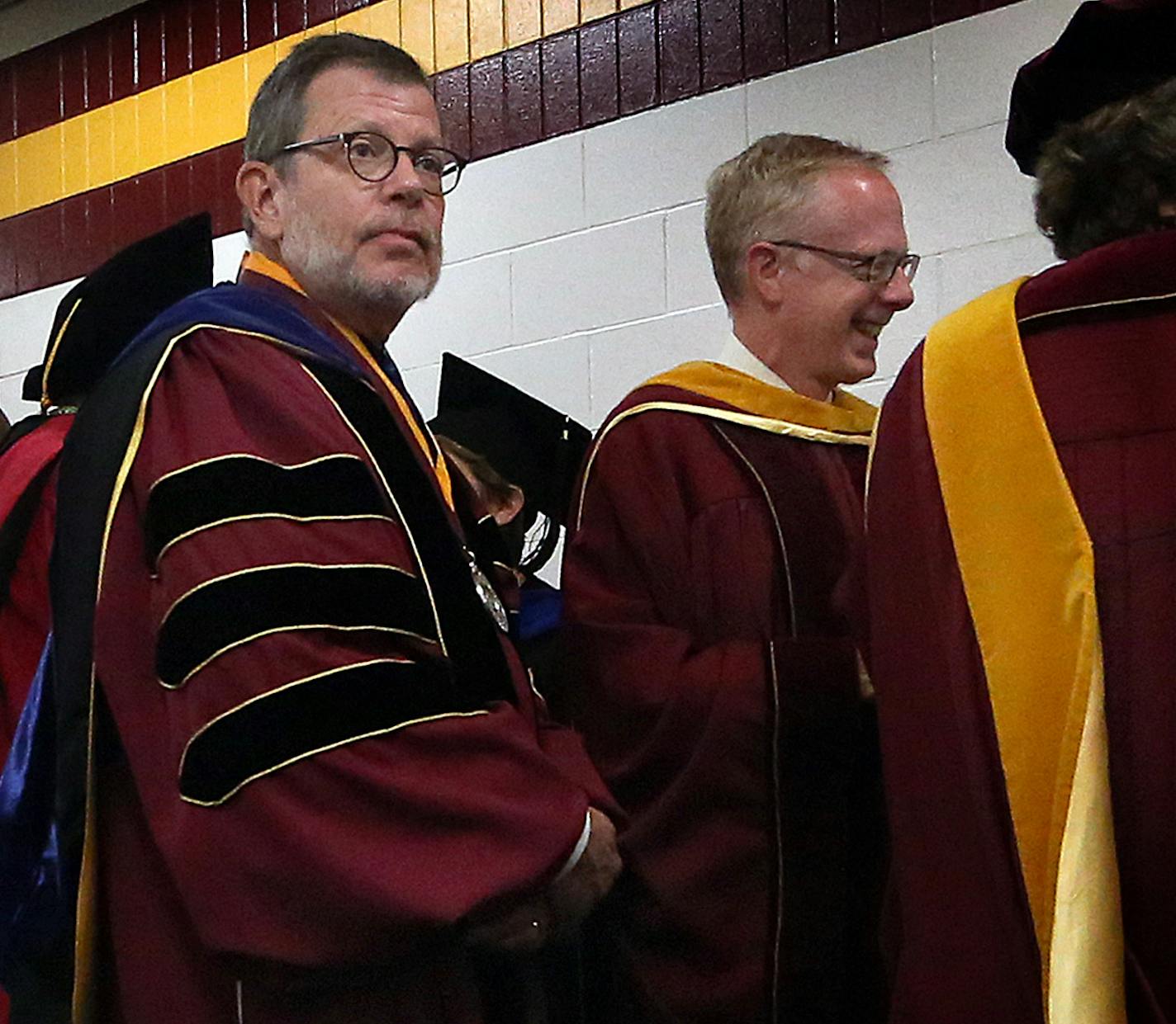 University of Minnesota President Eric Kaler (second from right), waited with faculty members to enter the arena area of Marriuci Arena to begin the celebration for the incoming freshman class of more than 5,000 students. ] JIM GEHRZ &#xef; james.gehrz@startribune.com / Minneapolis, MN / September 3, 2015 / 9:30 AM &#xf1; BACKGROUND INFORMATION: Since Norwood Teague's spectacular flameout at the U, critics have unleashed a torrent of abuse at the man who hired him: President Eric Kaler. After wh