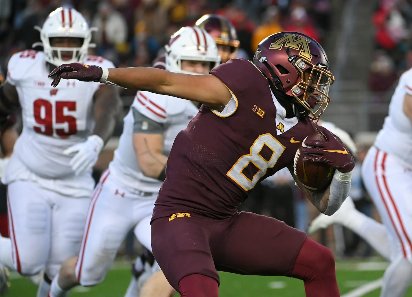 Minnesota Gophers running back Ky Thomas (8) runs the ball during the second quarter of an NCAA football game between the Minnesota Gophers and the Wisconsin Badgers Saturday, Nov. 27, 2021 at Huntington Bank Stadium in Minneapolis, Minn. ] AARON LAVINSKY • aaron.lavinsky@startribune.com