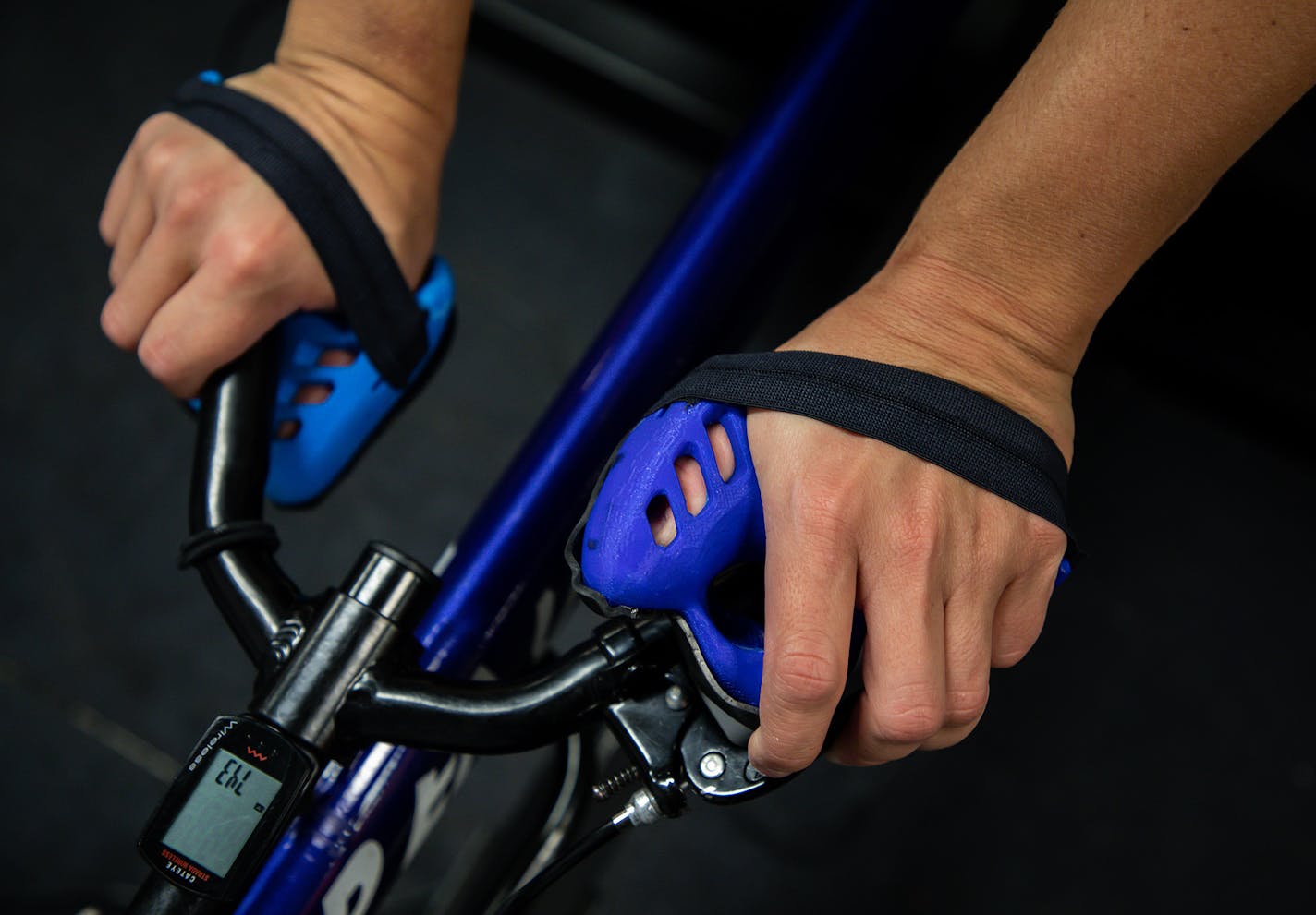 Arielle Rausin, founder of Ingenium Manufacturing, uses her custom wheelchair racing gloves during practice at the National Training Center for Wheelchair Track at the University of Illinois in Champaign, Ill., on October 3, 2019. (Zbigniew Bzdak/Chicago Tribune/TNS) ORG XMIT: 1456142