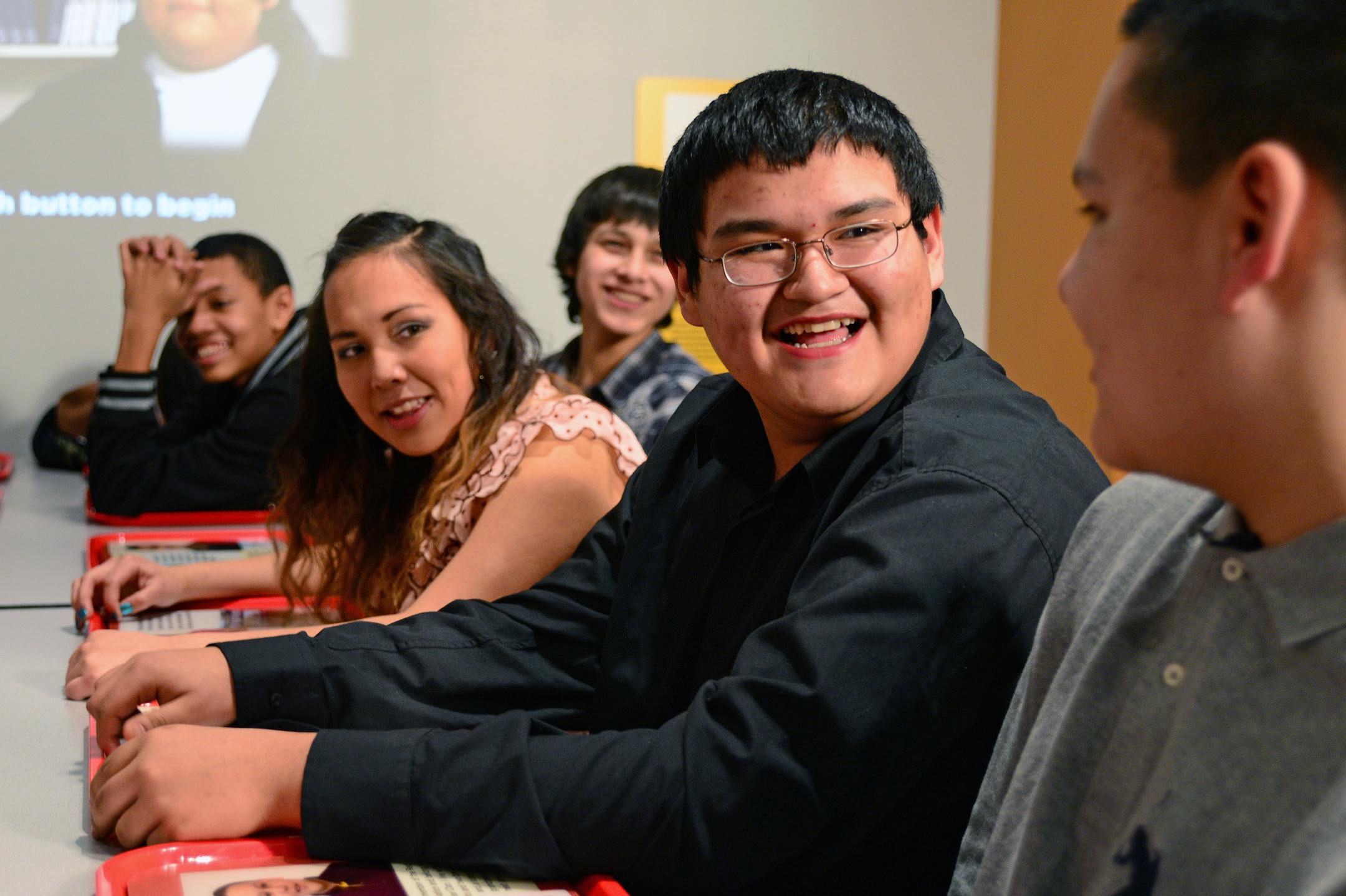James Norris, 14, laughed with his classmates while discussing the exhibit.