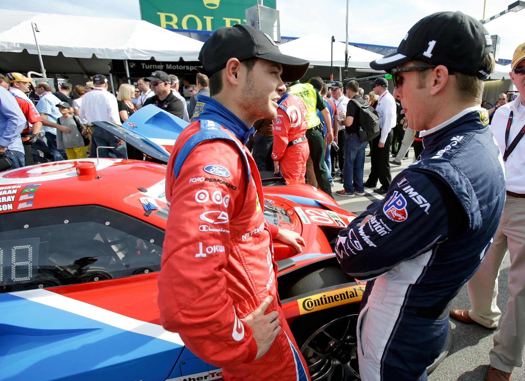 Drivers Kyle Larson, left, and Jamie McMurray, shown last year at Daytona.