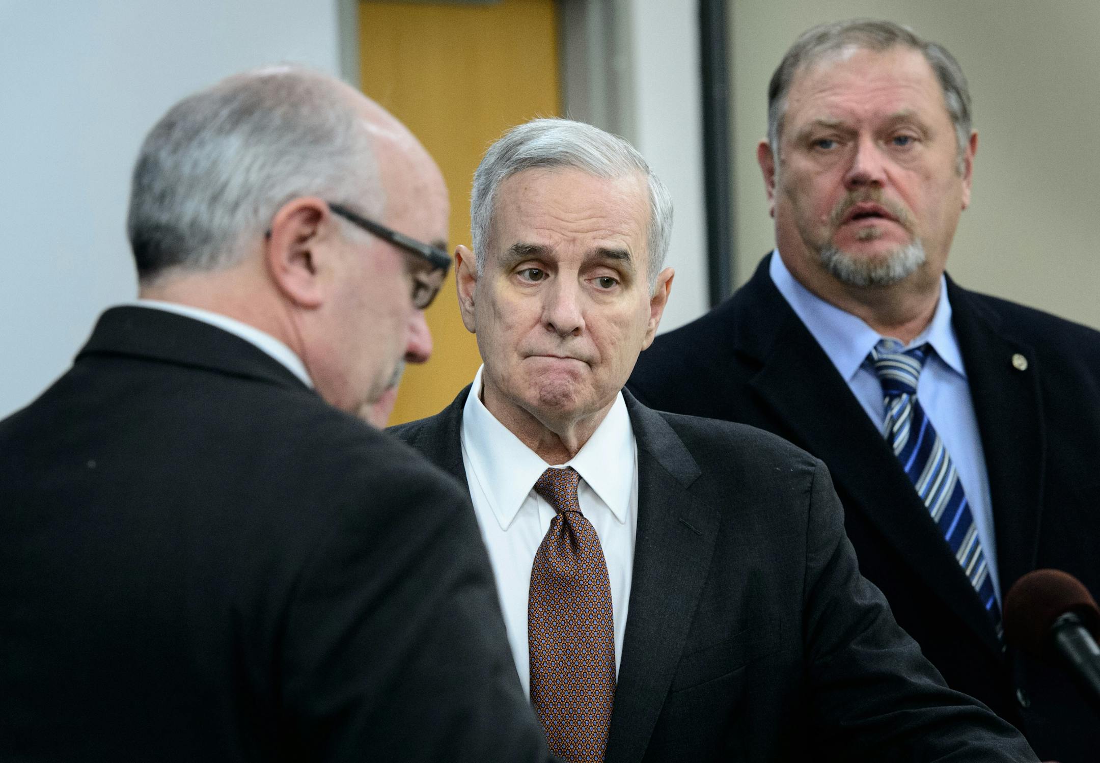 Governor Dayton and DFL Senate leaders talked about what they percieved as Republican resistance to a special session on Real ID, unemployment benefits for the Iron Range and racial disparities. From left are Senators David Tomassoni, Governor Dayton, Leader Tom Bakk. ] GLEN STUBBE * gstubbe@startribune.com Friday, January 29, 2016 Gov. Mark Dayton meets with legislative leaders again to see if they can broker a deal on a special session.