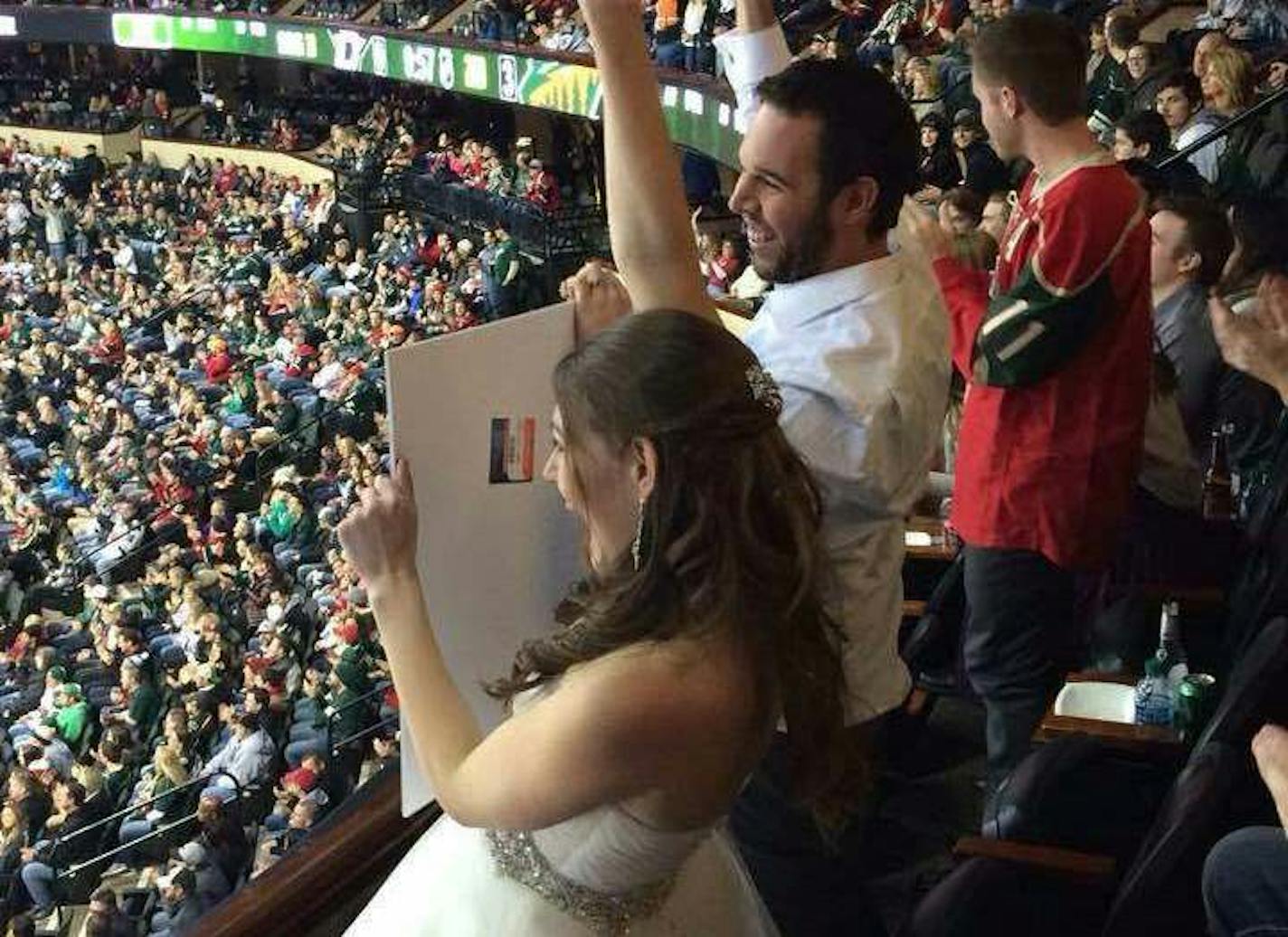 Wild fans Erica Skuta and Lewis Blake attended the game against the Dallas Stars as their "wedding finale."