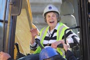 Sharing and Caring Hands founder Mary Jo Copeland helped tear down the building that housed her dream for 30 years Thursday, April 23, 2015 in Minneap