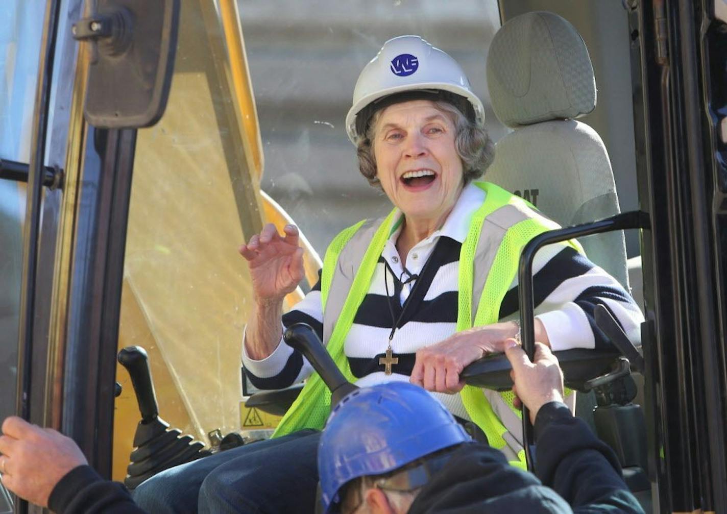 Sharing and Caring Hands founder Mary Jo Copeland helped tear down the building that housed her dream for 30 years Thursday, April 23, 2015 in Minneapolis, to make way for an expansion.