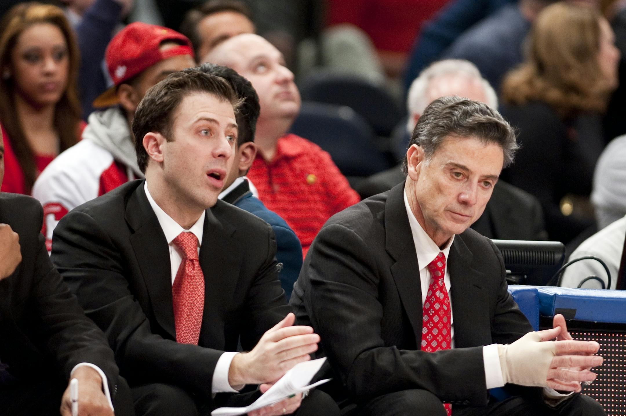 March 10 2012: Louisville's head coach Rick Pitino with son, associate coach Richard Pitino, during the Big East Championship game between the Louisville Cardinals and the Cincinnati Bearcats at Madison Square Garden in New York City. Louisville defeated Cincinnati 50-44.