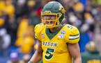 North Dakota State quarterback Trey Lance (5) reacts after his team scored a touchdown during the first half of the FCS championship NCAA college foot