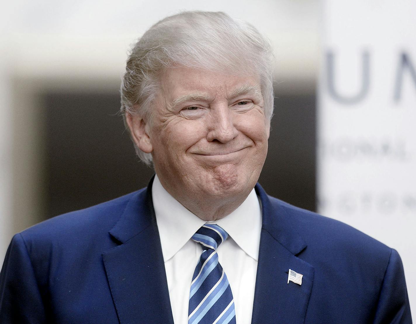 Republican presidential nominee Donald Trump looks on at the grand opening of the Trump International Hotel on October 26, 2016 in Washington, DC. (Olivier Douliery/Abaca Press/TNS) ORG XMIT: 1192246