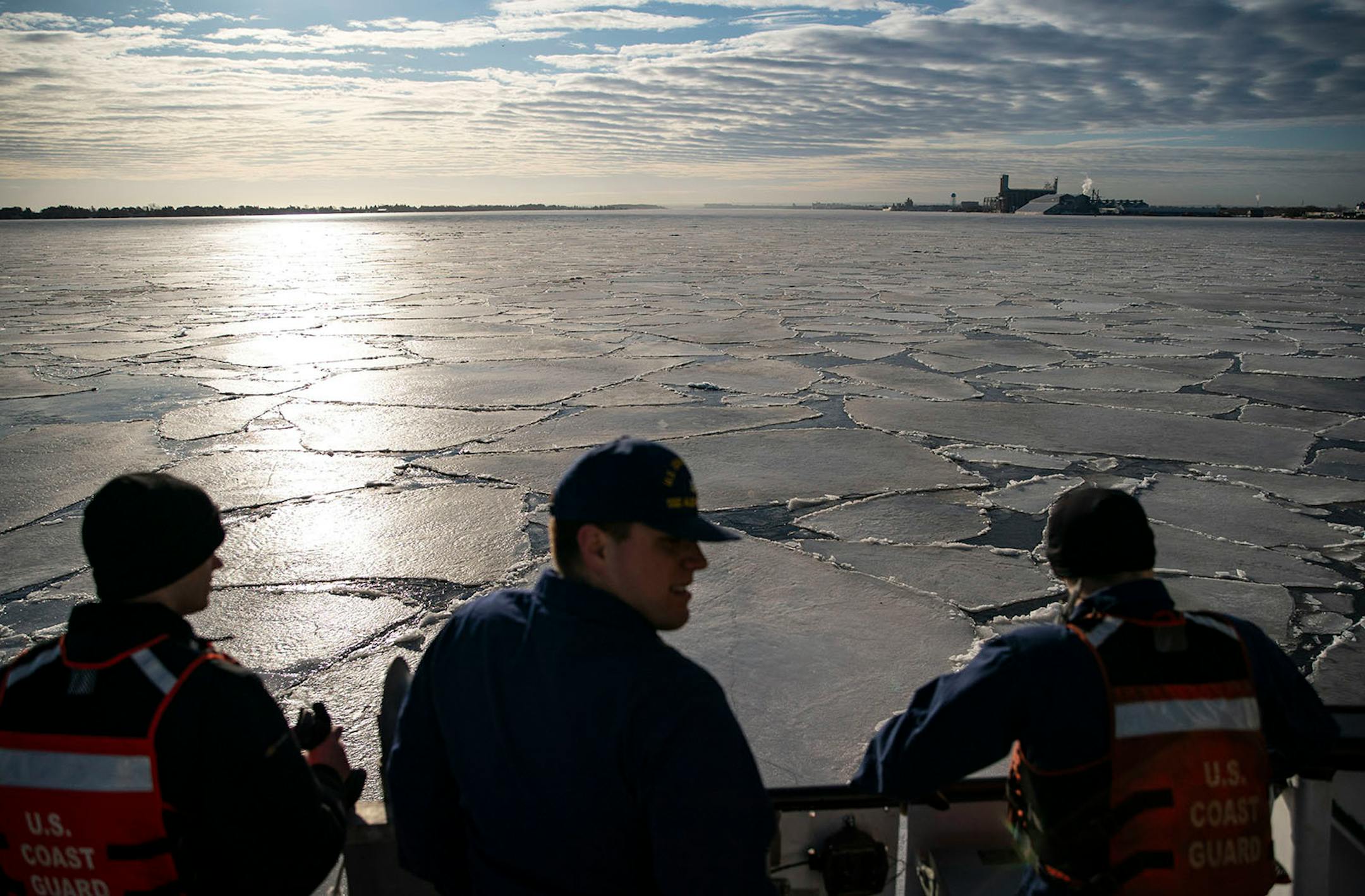 Crewmen on the USCGC Alder looked out at the large chunks of ice floating in the Duluth Bay on Tuesday morning.