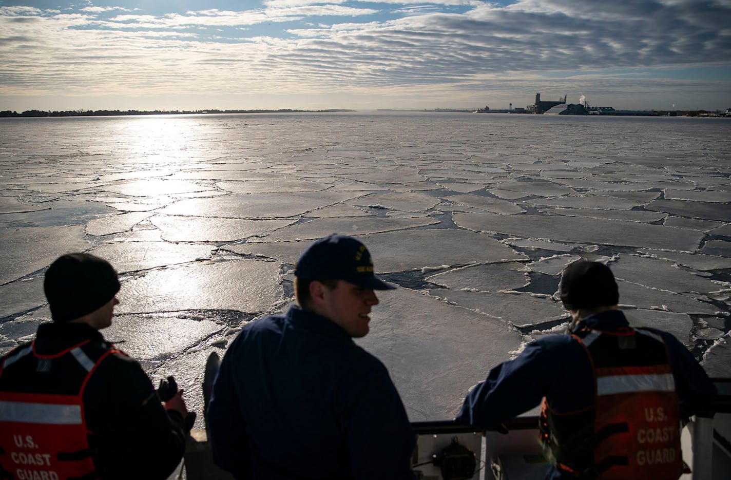 Crewmen on the USCGC Alder looked out at the large chunks of ice floating in the Duluth Bay on Tuesday morning.