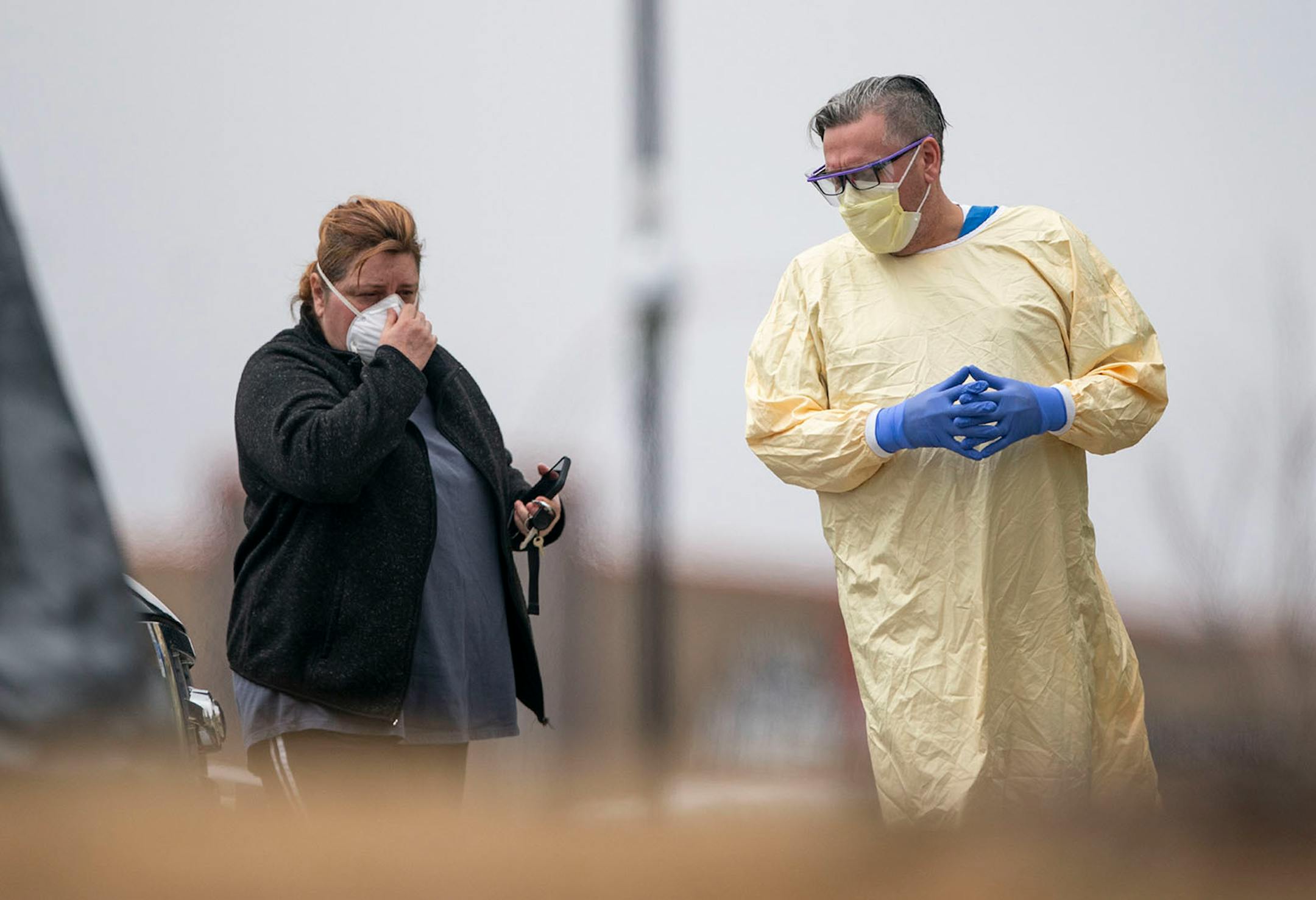 A medical assistant walked a patient into St. Luke's Miller Creek Medical Clinic in Duluth for COVID-19 testing on Monday.