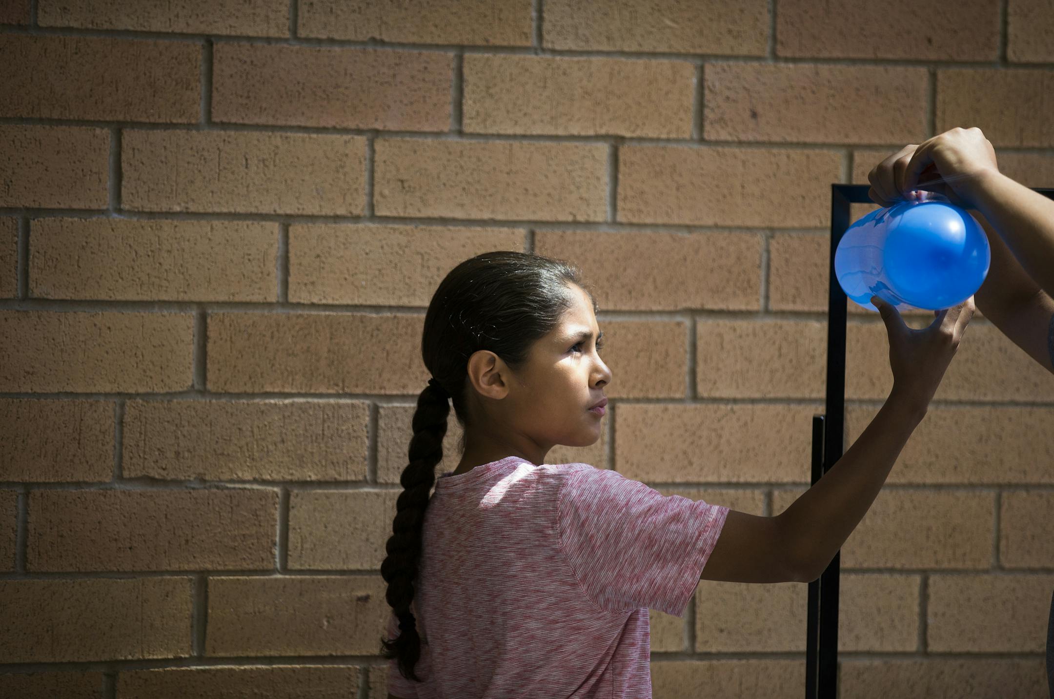 Julian Greendeer, 10, of Wisconsin plays with a balloon rocket at the Science Museum of Minnesota in St. Paul on Tuesday, June 30, 2015. ] LEILA NAVIDI leila.navidi@startribune.com / BACKGROUND INFORMATION: As part of &#xec;STEM Day&#xee; at the Science Museum of Minnesota, Native American students from Minneapolis and St. Paul had an opportunity to participate in interactive, hands-on, activities and to contribute to national policy on STEM (Science, Technology, Engineering and Mathematics) edu