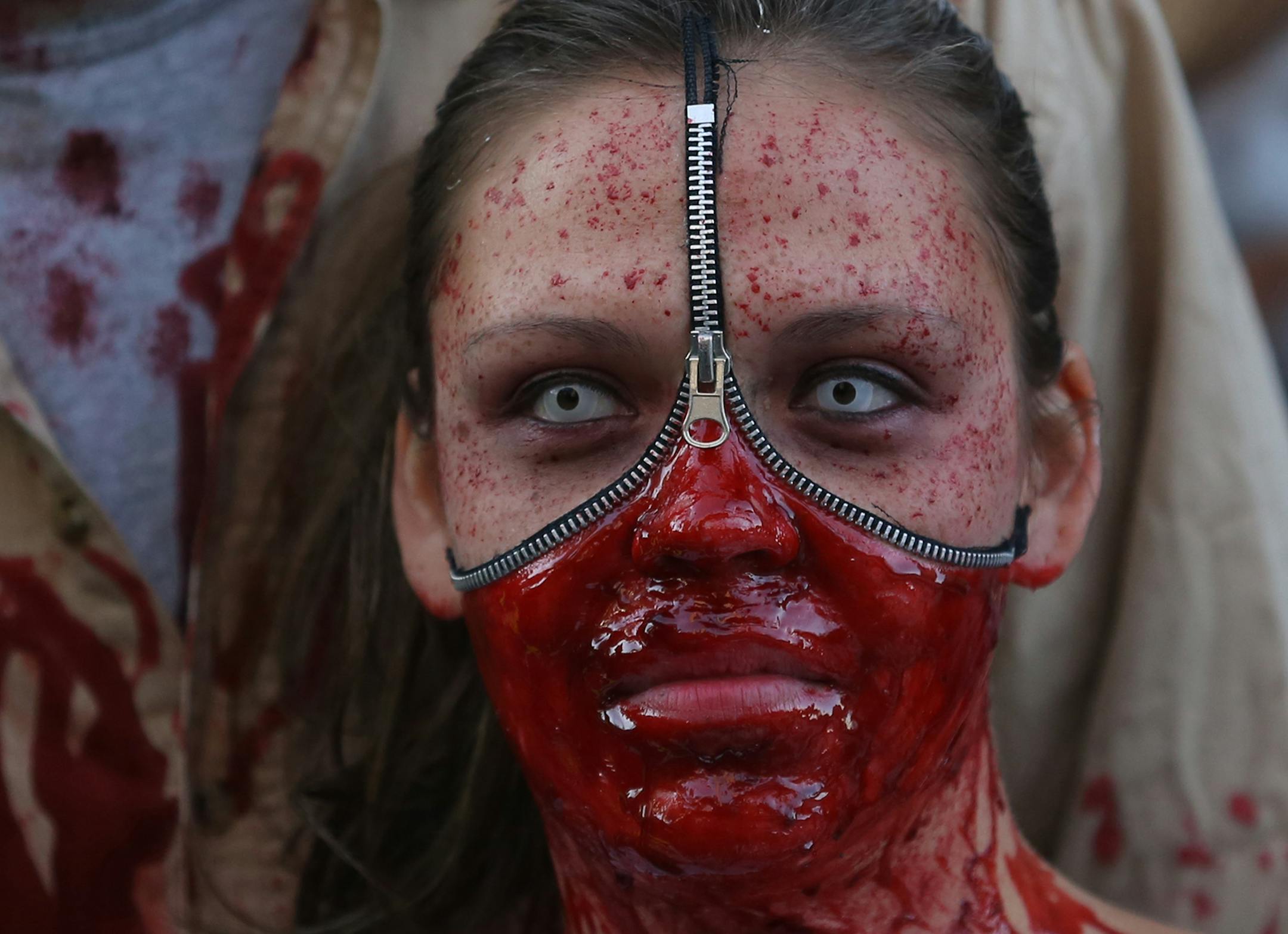 Melissa Diaz, of Champlin, posed for a picture while waiting to head into the Zombie Pub Crawl. ] (KYNDELL HARKNESS/STAR TRIBUNE) kyndell.harkness@startribune.com Zombie Pub Crawl in Minneapolis, Min., Saturday October 17, 2015.