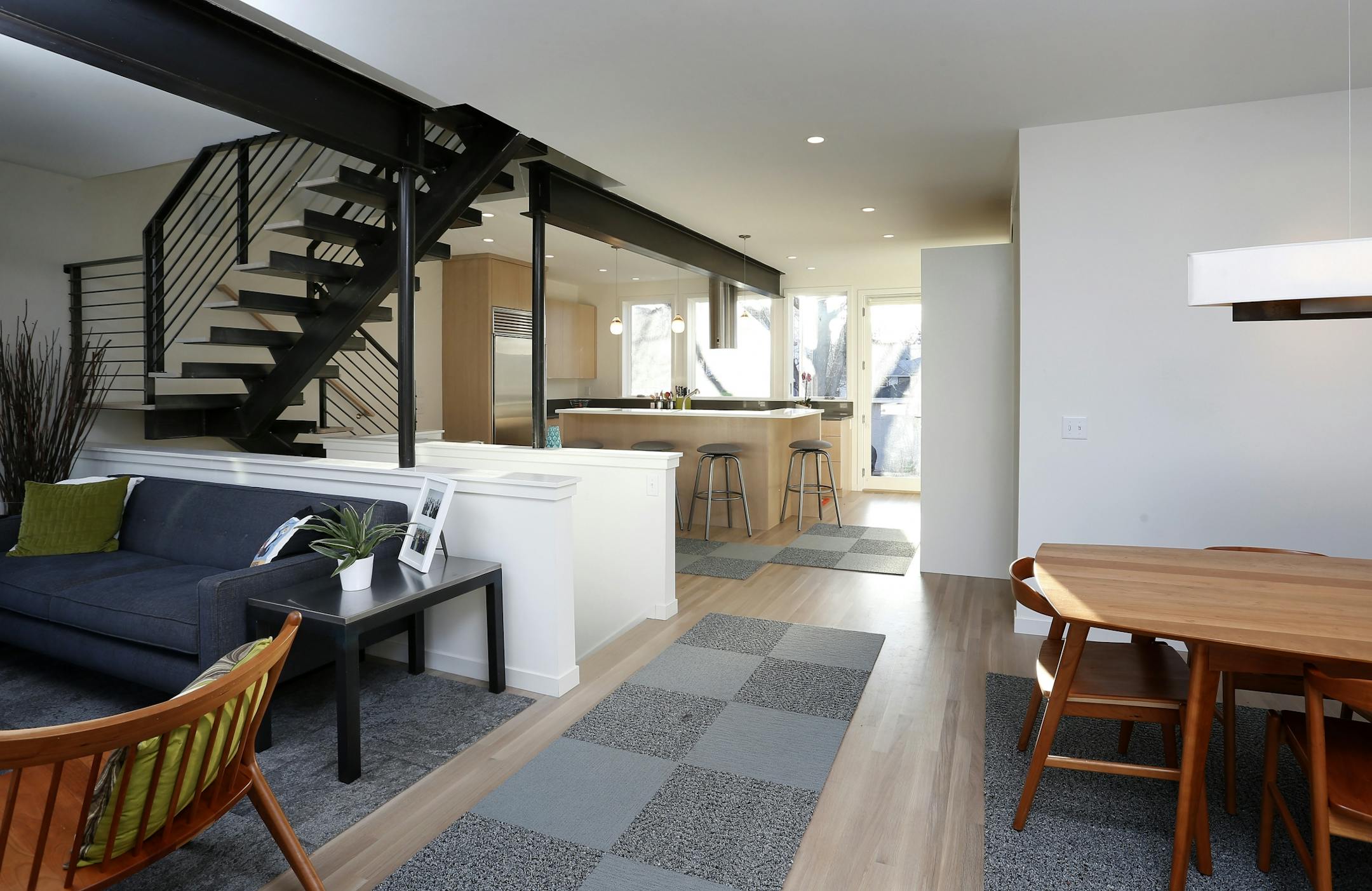 The open floor plan allows light and movement throughout the main floor.