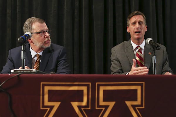 One day after being introduced as Gophers athletic director, Mark Coyle (right) continued to make the rounds Thursday. &#x201c;It brings back a lot of