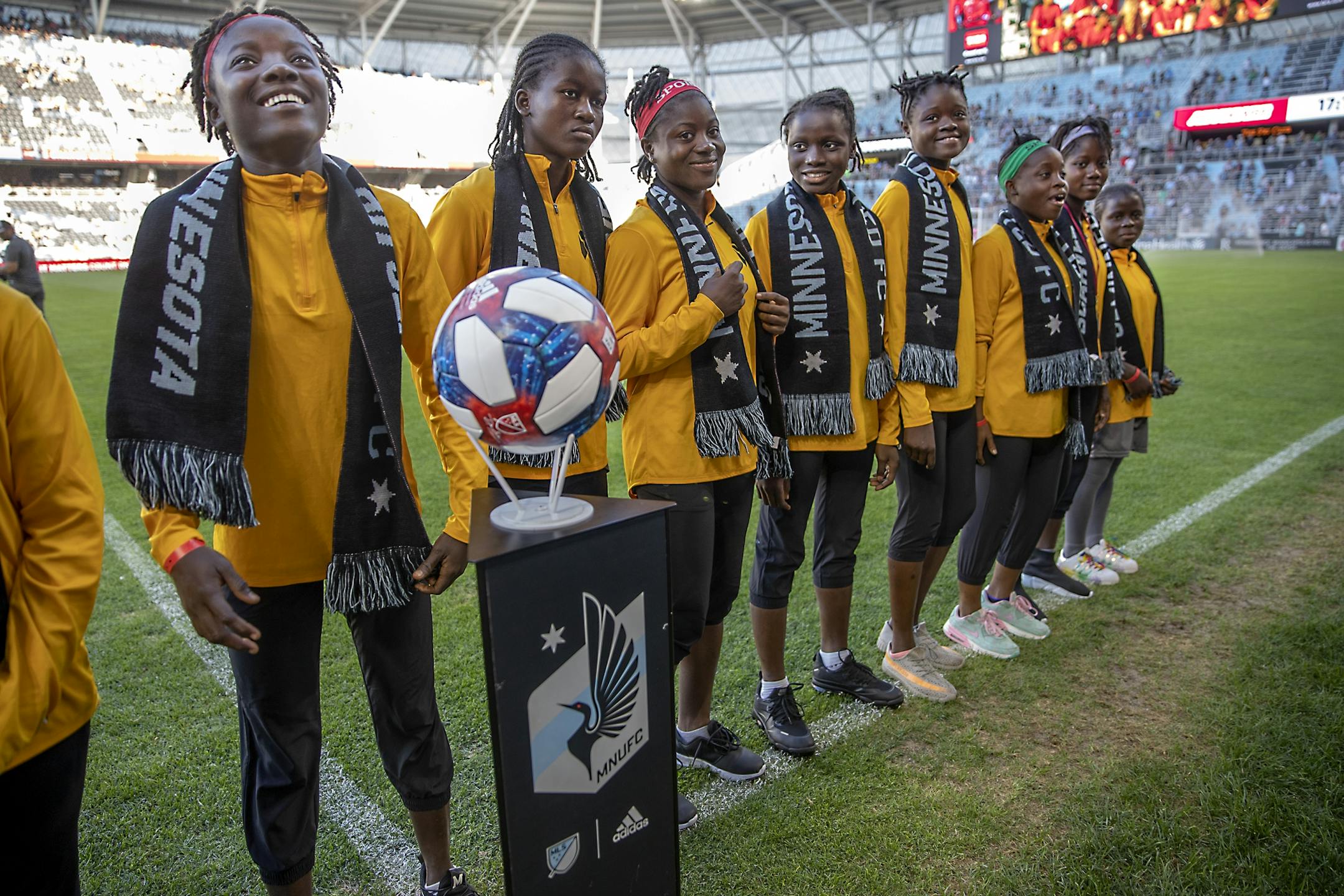 Monrovia Football Academy's U15 team were invited by the Minnesota United Loons to take the field to be recognized before a friendly game at Allianz Field, Wednesday, July 18, 2019 in St. Paul, MN.