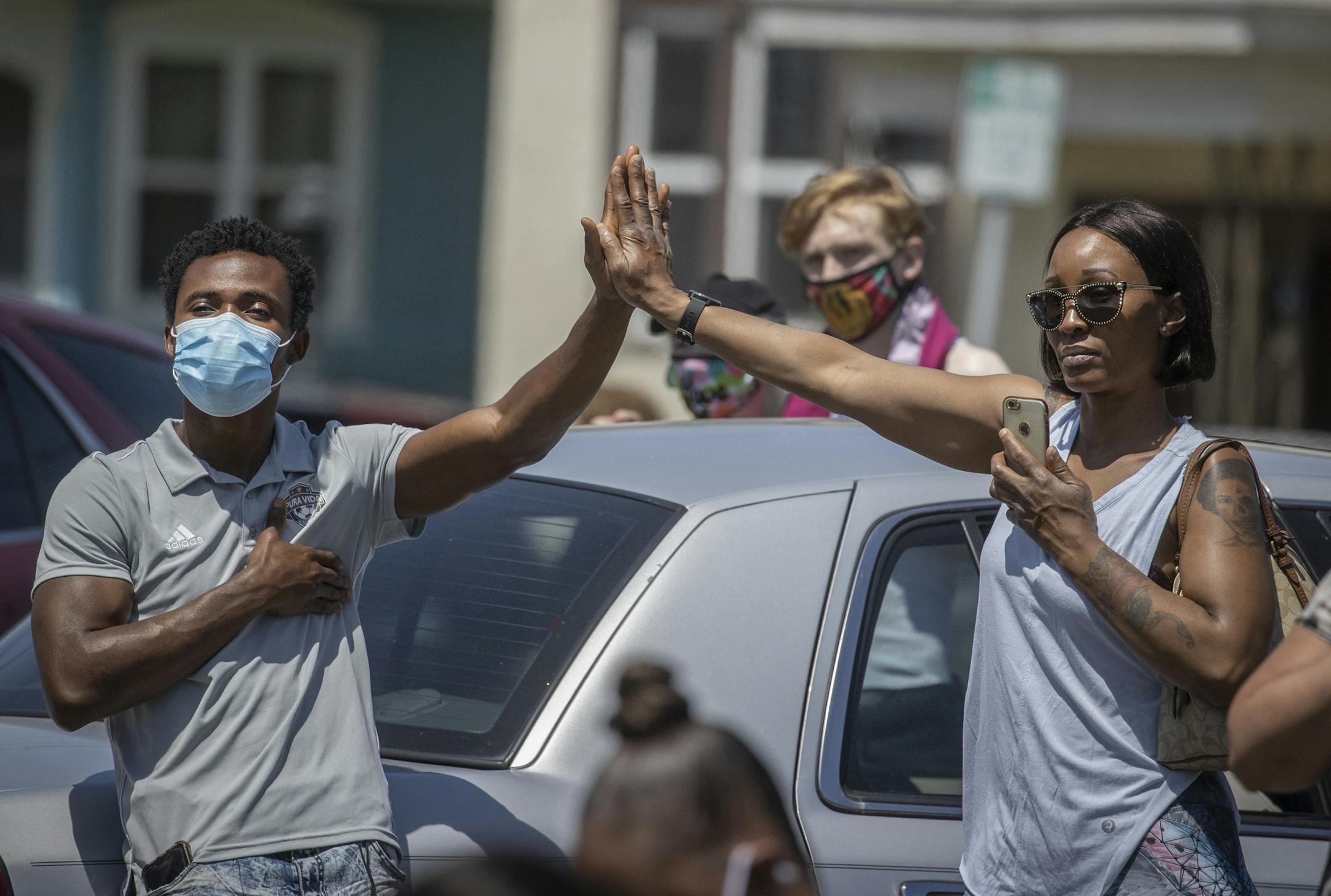 Many who showed up to pay their respect and see the George Floyd memorial joined an outside church service at Worldwide Outreach for Christ Church on the corner of Chicago and 38th Street, Sunday, May 31, 2020 in Minneapolis, MN.
