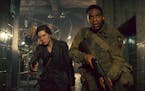 (L-R) Mathilde Ollivier as Chloe, Jovan Adepo as Boyce in the film "Overlord." Photo credit: Peter Mountain/Paramount Pictures