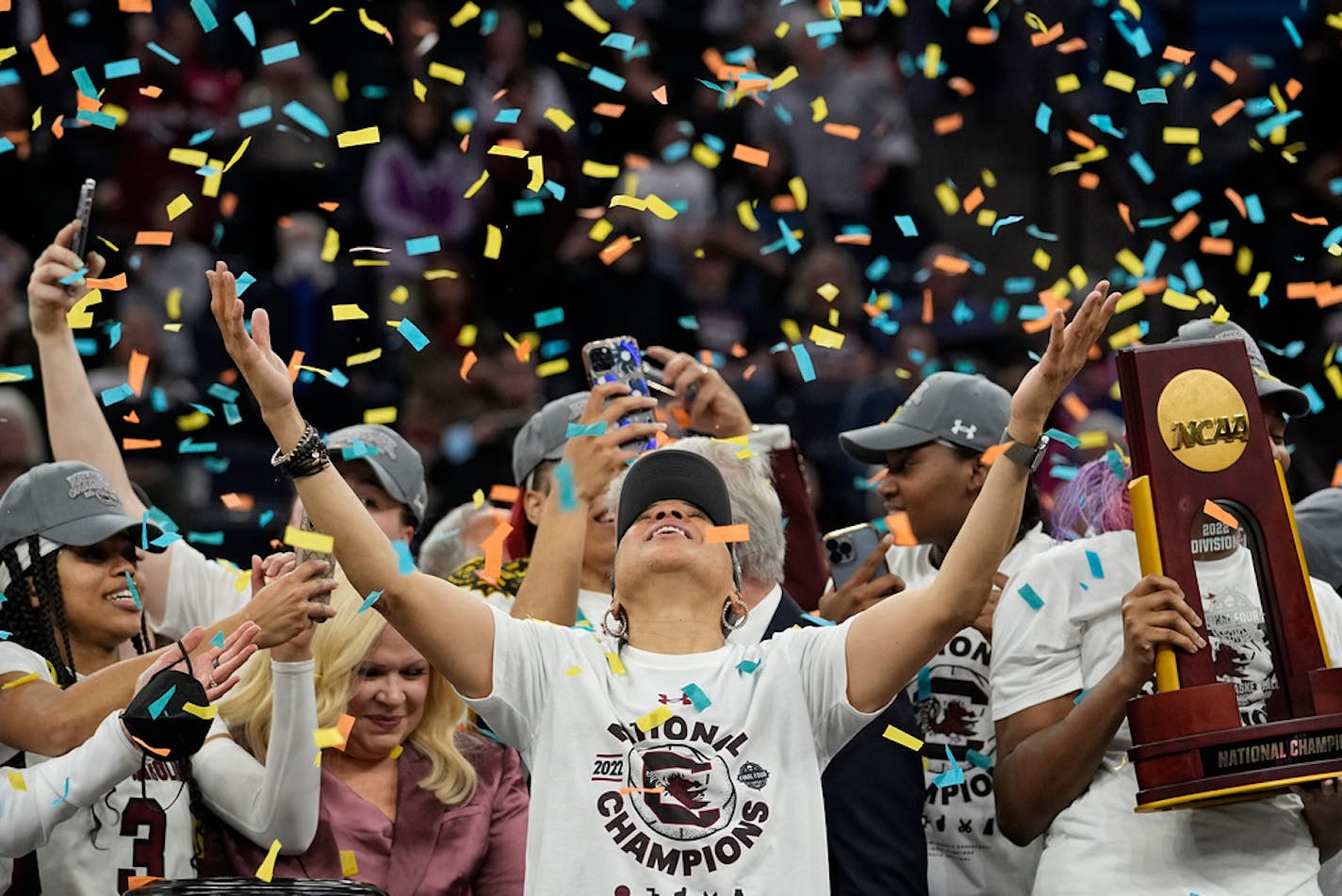 FILE - South Carolina head coach Dawn Staley celebrates after a college basketball game in the final round of the women's Final Four NCAA tournament against UConn, Sunday, April 3, 2022, in Minneapolis. The NCAA women's basketball title game will be broadcast on ABC for the first time this season. The championship game, which usually airs in primetime, will be played at 3 p.m. ET. The Final Four is in Dallas this year. (AP Photo/Eric Gay, File)