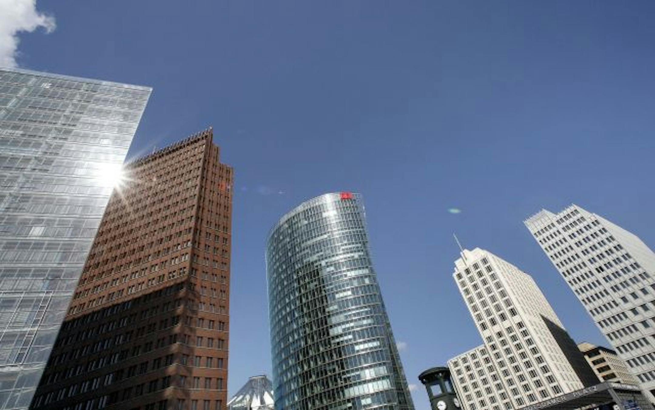 FILE - In this May 2, 2008 file pictures skyscrapers at Potsdamer Platz in Berlin are photographed. Berlin has long been a rarity among the great cities of Europe: exciting, freewheeling, beautiful and cheap. Now, as Germany prepares to mark 20 years since east and west were reunited as one, Berlin is finally undergoing the boom that lawmakers had envisioned when they tapped as the nation's capital in 1991 and that is causing worries that its "poor but sexy" image is under threat.