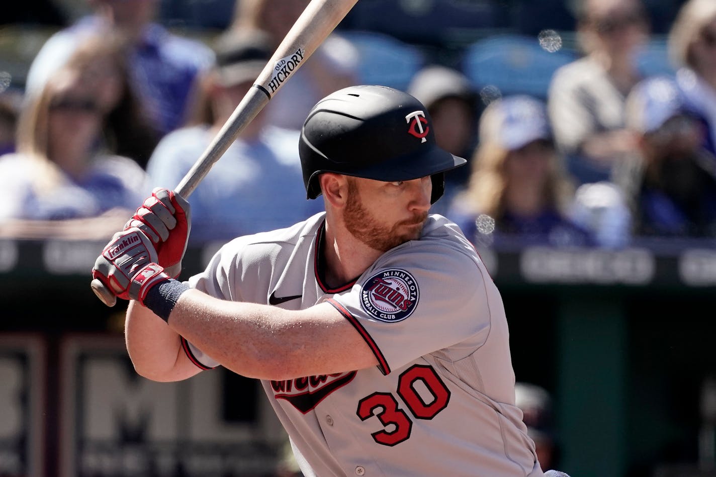 Minnesota Twins' Kyle Garlick bats during the eighth inning of a baseball game against the Kansas City Royals Sunday, May 22, 2022, in Kansas City, Mo. (AP Photo/Charlie Riedel)