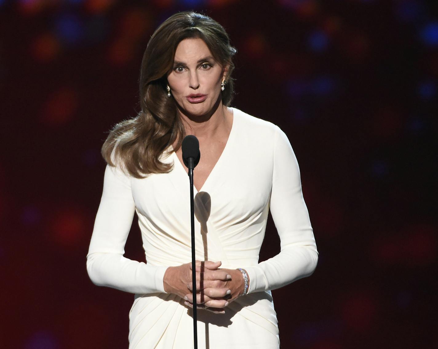 FILE - In this Wed., July 15, 2015 file photo, Caitlyn Jenner accepts the Arthur Ashe award for courage at the ESPY Awards at the Microsoft Theater in Los Angeles. The Los Angeles County District Attorney's Office said Tuesday, Aug. 25, 2015, that it was reviewing evidence submitted by investigators for a possible criminal charge against Jenner over a February crash on a coastal highway that killed a woman. There is no timetable for when prosecutors will decide whether to file or reject charges