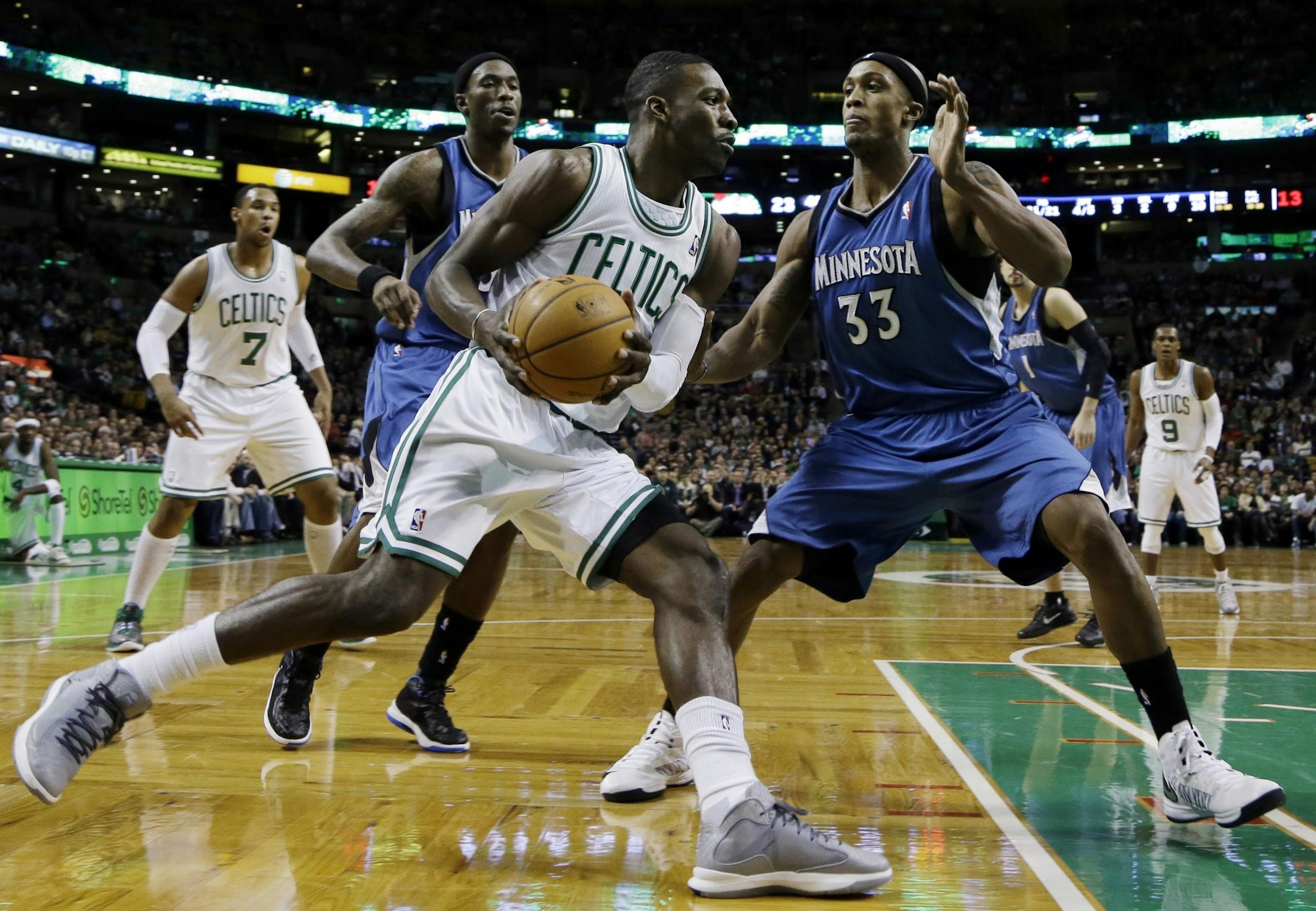 Celtics forward Jeff Green, front left, drives against Timberwolves forward Dante Cunningham (33).