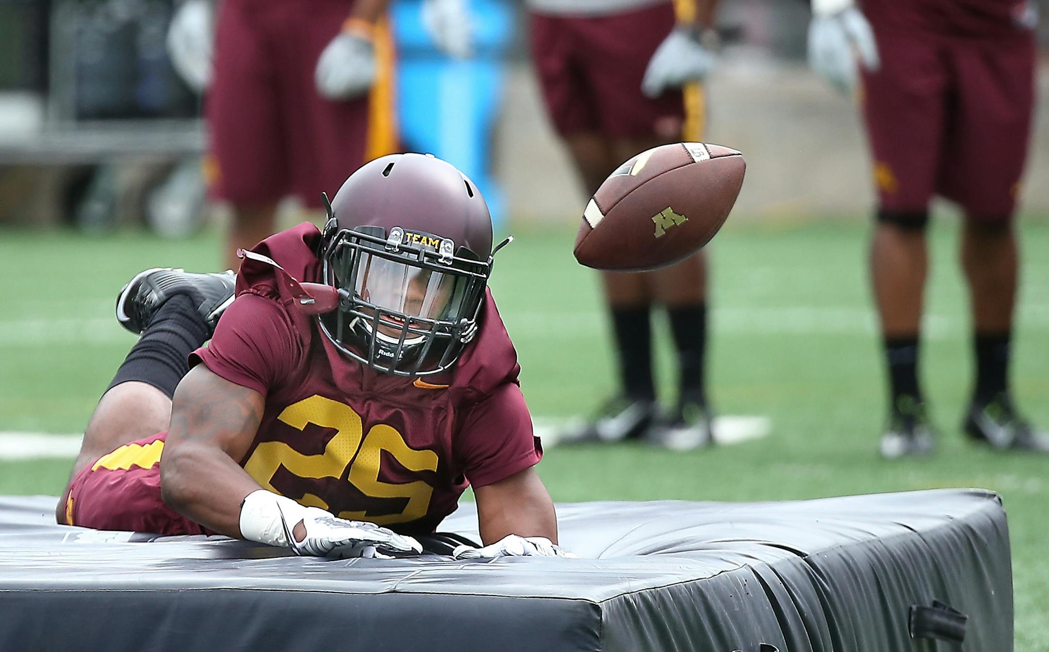 Minnesota football players took to the field, including Ray Buford, for drills during the first practice of the season for Gophers football at Gibson-Nagurski field, Friday, August 7, 2015 in Minneapolis, MN.