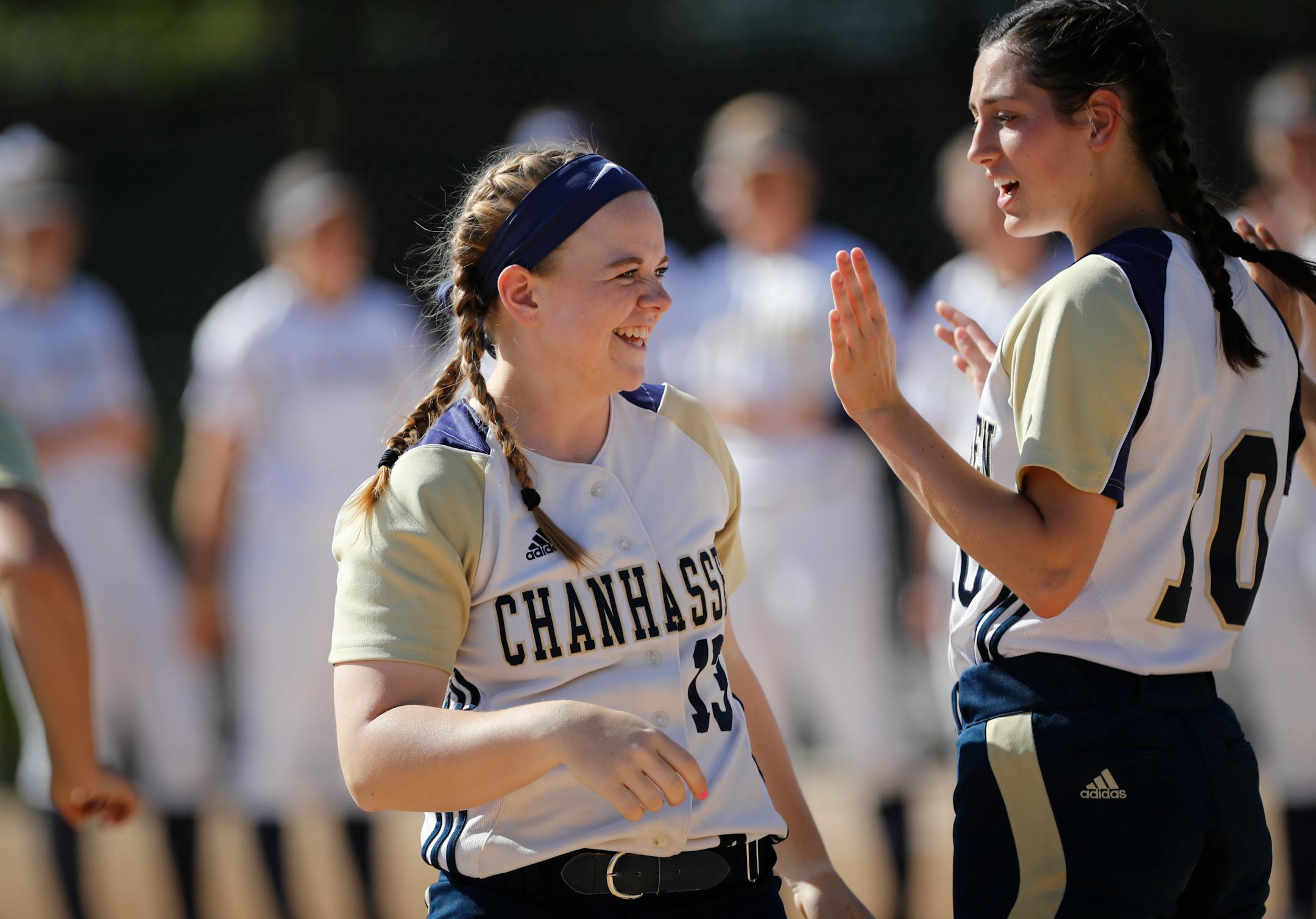 Chanhassen's Marybeth Olson, with teammate Taylor Manno (right), is the Star Tribune Metro Player of the Year in softball.