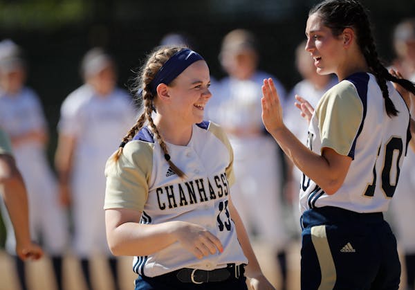 Chanhassen's Marybeth Olson, with teammate Taylor Manno (right), is the Star Tribune Metro Player of the Year in softball.