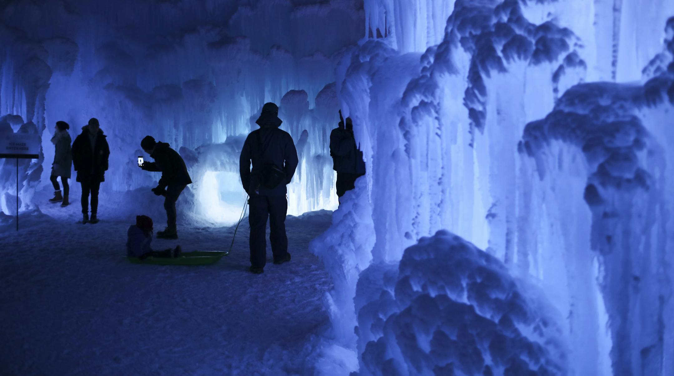Visitors inside the Ice Castles at the Lift Bridge Sunday night. ] JEFF WHEELER &#xef; jeff.wheeler@startribune.com The town of Stillwater is hosting Ice Castles at the Lift Bridge in Lowell Park from now until as late as March, depending on the weather. The frozen spectacle is open daily afternoons and evenings, except Tuesdays.