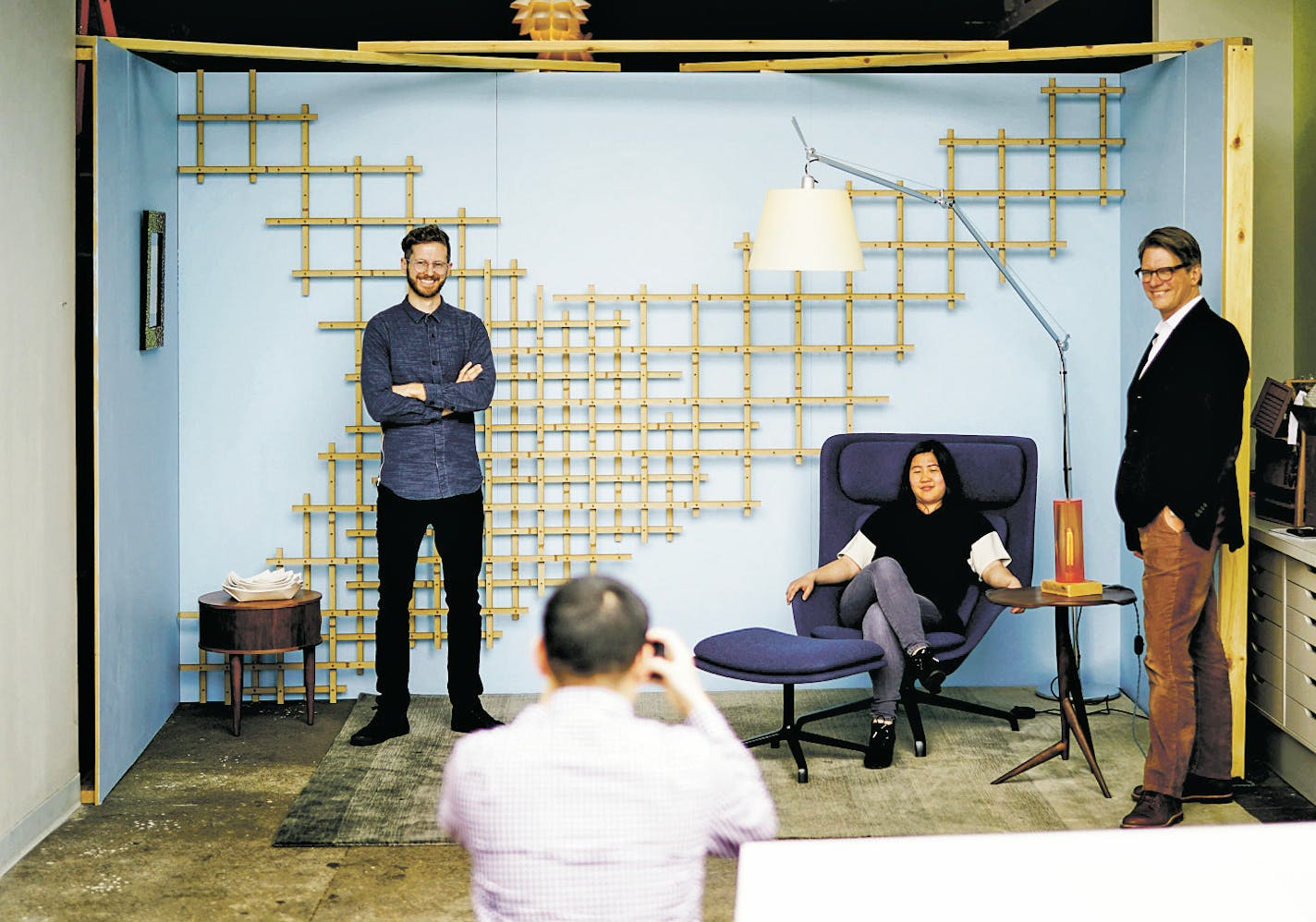 Charles Kennedy, left, Tiffany Chen and Paul Udris of U + B Architecture & Design in the room hey designed for the American Craft Show.