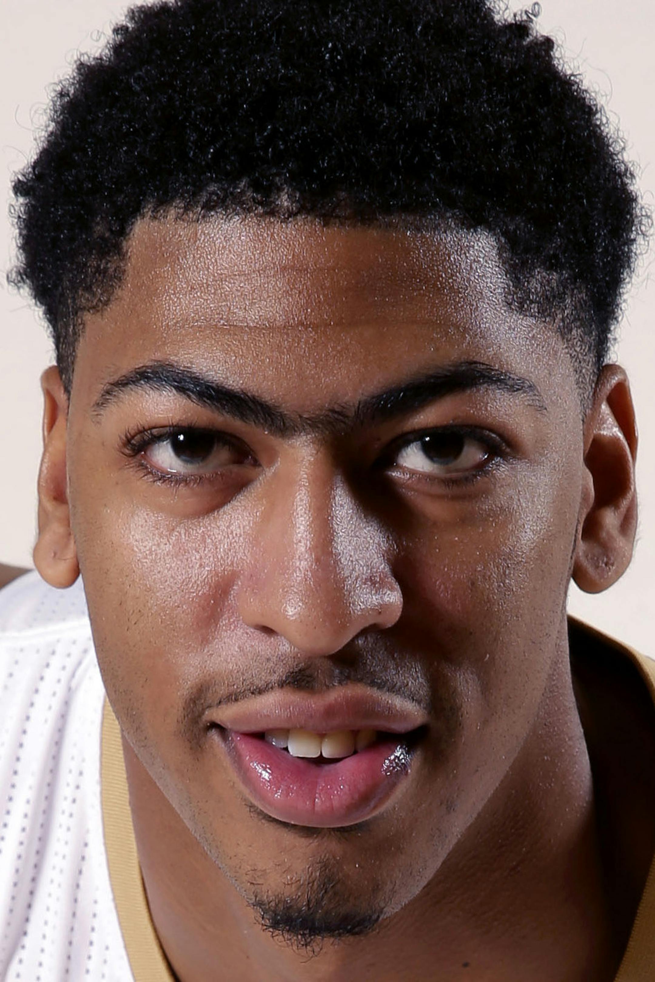 New Orleans Pelicans forward Anthony Davis (23) poses at the Pelicans NBA basketball media day in Metairie, La., Monday, Sept. 29, 2014. (AP Photo/Gerald Herbert) ORG XMIT: NYOTK