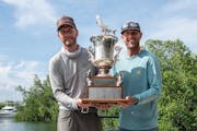 Evan Carruthers, left, and his guide, Greg Dini, recently won the Don Hawley Invitational, one of the big three tarpon fishing tournaments.
