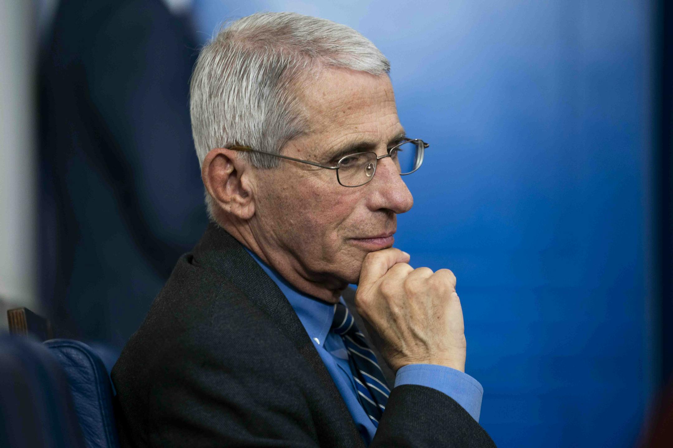 FILE -- Dr. Anthony Fauci looks on as President Donald Trump held a daily coronavirus briefing at the White House in Washington, April 6, 2020. As the pandemic worsened, Fauci's darker view of the circumstances was countered within the White House by the reassurances ostensibly offered by Dr. Deborah Birx's data. (Doug Mills/The New York Times) ORG XMIT: XNYT50