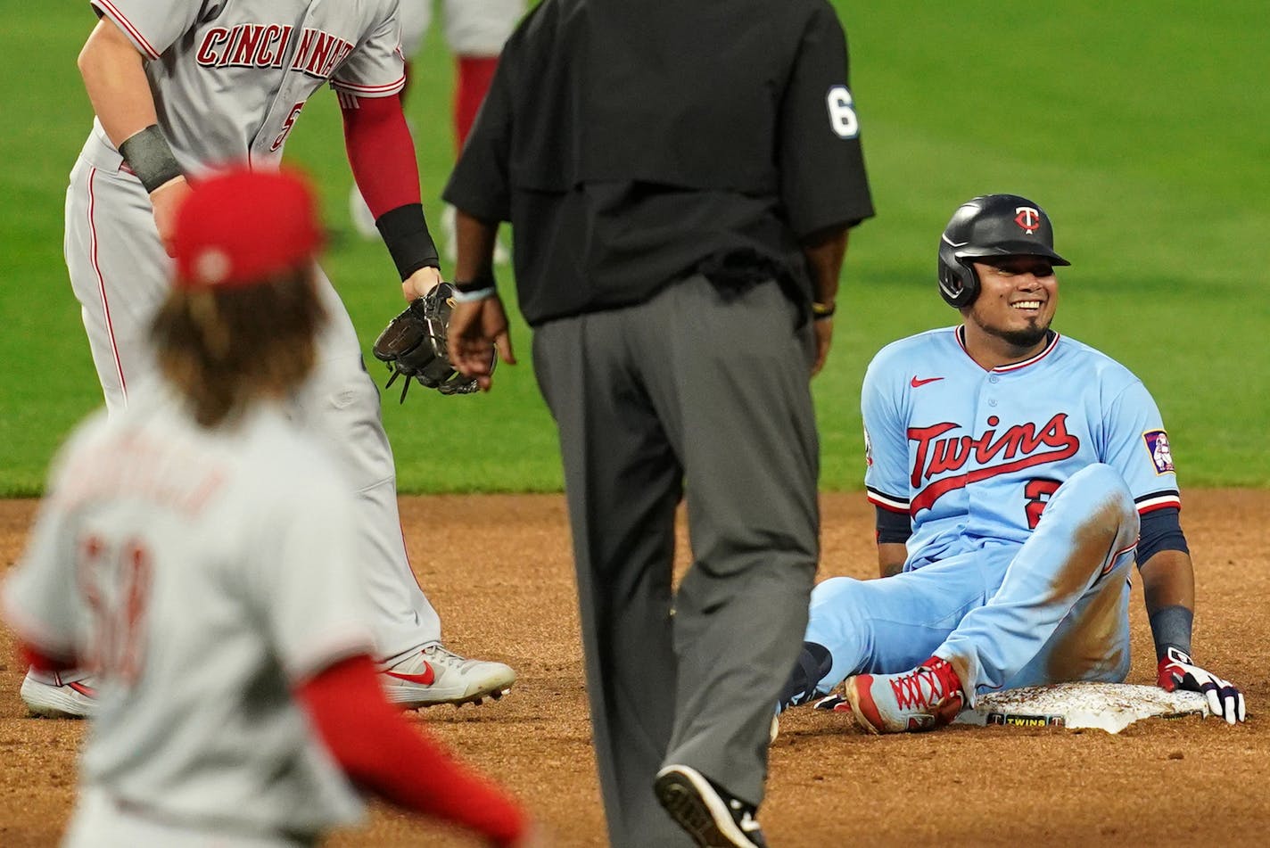 Minnesota Twins second baseman Luis Arráez (2) smiled as he slid safe into second for a double in the first inning. ] ANTHONY SOUFFLE • anthony.souffle@startribune.com The Minnesota Twins played the Cincinnati Reds in the second of a three game MLB series Saturday, Sept. 26, 2020 at Target Field in Minneapolis.