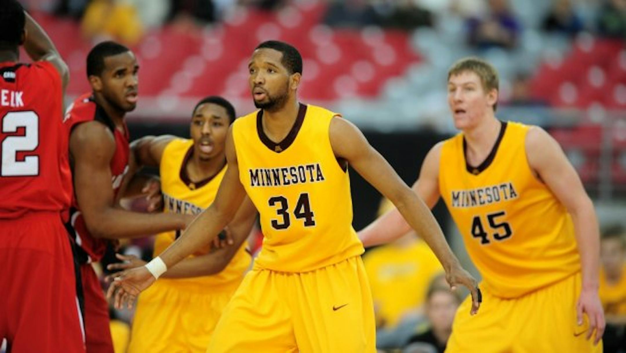Dec. 20, 2008; Glendale, AZ, USA; Minnesota Golden Gophers forward (34) Damian Johnson against the Louisville Cardinals during the Stadium Shootout at University of Phoenix Stadium. Mandatory Credit: Mark J. Rebilas-USA TODAY Sports