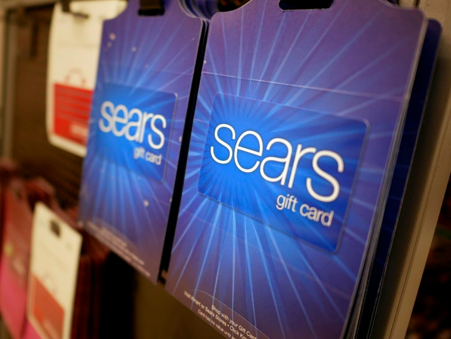 Sears gift cards are displayed at a store in Hackensack, N.J., Monday, Oct. 15, 2018. Sears filed for Chapter 11 bankruptcy protection Monday, buckling under its massive debt load and staggering losses. (AP Photo/Seth Wenig)