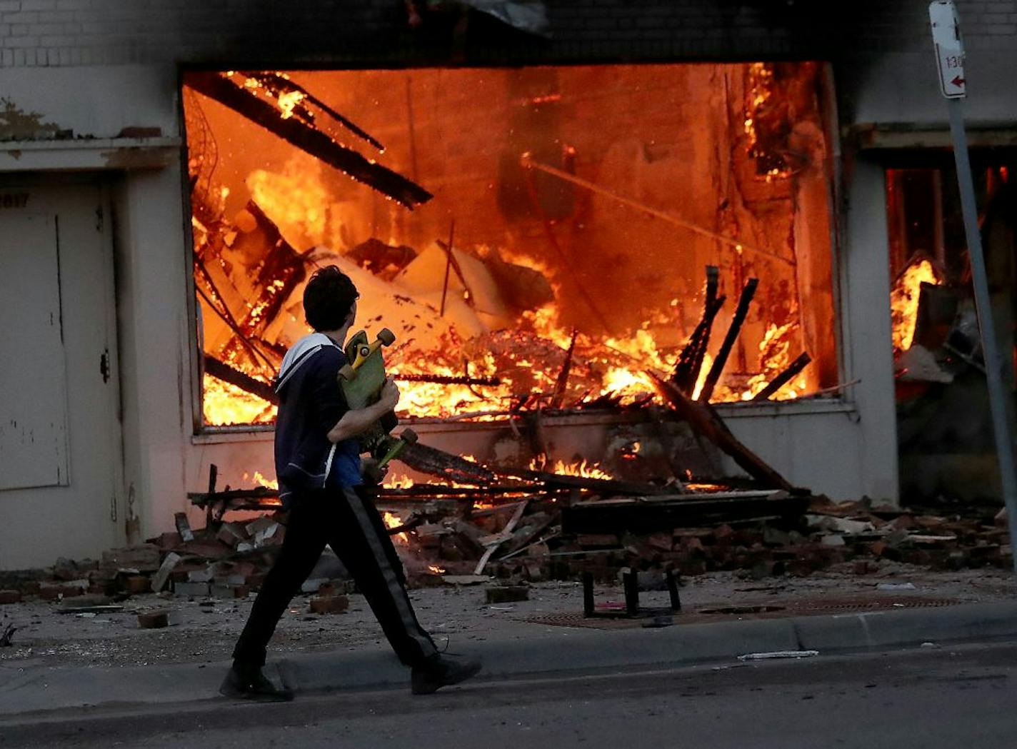 A fire burned in a building on E. Lake Street in Minneapolis early Thursday.