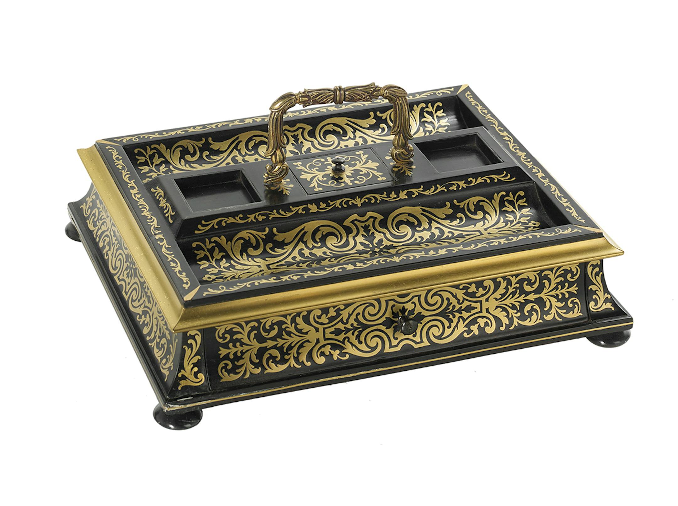 This brass inlaid inkstand was made in Victorian London. A label on its base provides insight into its history. (c) 2023 by Cowles Syndicate Inc.