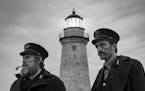 This image released by A24 Films shows Willem Dafoe, left, and Robert Pattinson in a scene from "The Lighthouse." Amazon Prime has Robert Eggers&#x201