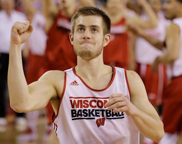 Wisconsin's Jordan Smith of Orono reacted after making a halfcourt shot during a practice session for the NCAA Final Four on Friday. Wisconsin plays D