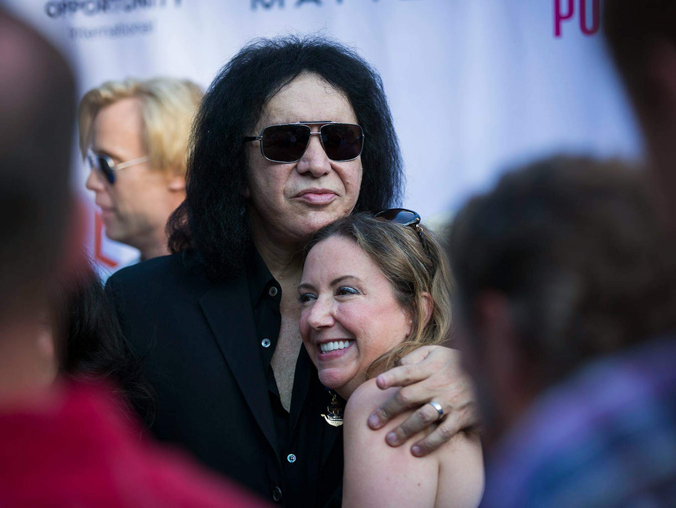Kiss' Gene Simmons posed for pictures Monya Kampa of St. Paul before a charity event at the home of local philanthropist Martha "Muffy" MacMillan on Tuesday, August 2, 2016, in Long Lake, Minn.
