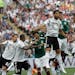 Germany's Sami Khedira, third from right, and Mexico's Hirving Lozano challenge for the ball during the group F match between Germany and Mexico at th