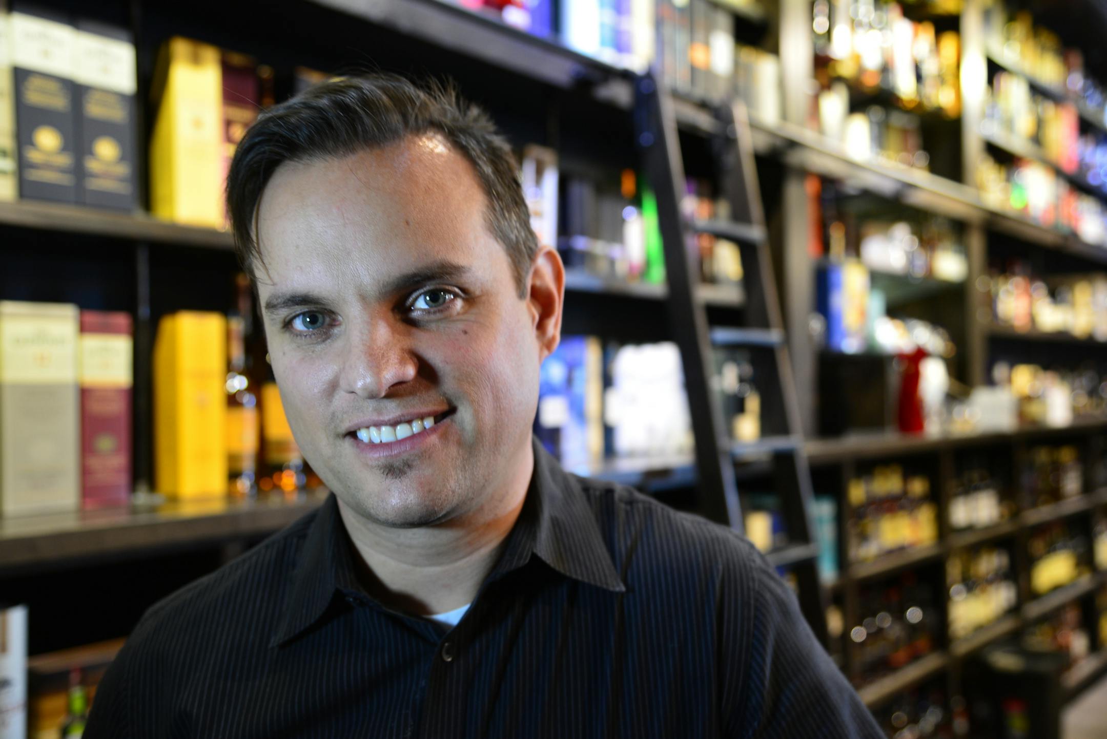 Ace Spirits, a new whiskey and craft beer boutique, opened in Hopkins this week. Owner Louis Dachis said that it will sell every whiskey available in MN. The store shelves are over 11 ft high and bring new meaning to "Top Shelf " ] Richard.Sennott@startribune.com Richard Sennott/Star Tribune Hopkins , Minn. Wednesday 3/26/2014) ** (cq)