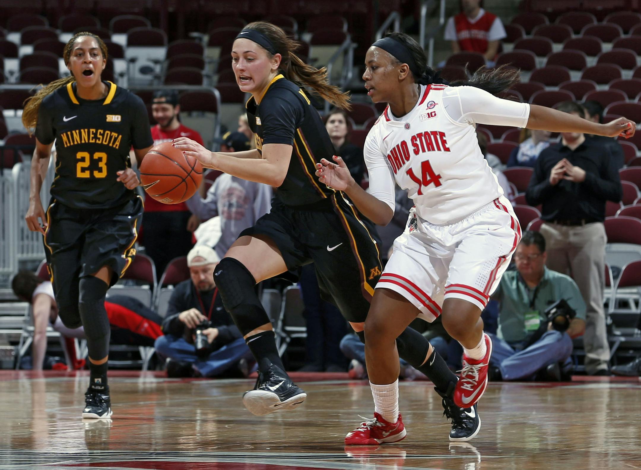 Minnesota's Shayne Mullaney (3) is guarded by Ohio State's Ameryst Alston (14) during an NCAA college basketball game, Thursday, Jan. 15, 2015 in Columbus, Ohio. (AP Photo/The Columbus Dispatch, Barbara J. Perenic)