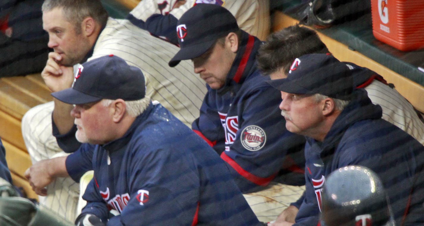 MARLIN LEVISON &#x201a;&#xc4;&#xa2; mlevison@startribune.com Twins vs. Toronto. Toronto won 9-3. IN THIS PHOTO:It was a long afternoon for Twins manager Ron Gardenhire, left, players and coaches as they watched Toronto score six runs in the 11th inning.