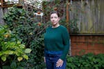Emily Baden stands in the backyard at her home, on May 20, 2024. Justice Samuel Alito said his wife, Martha-Ann Alito, raised an inverted American fla