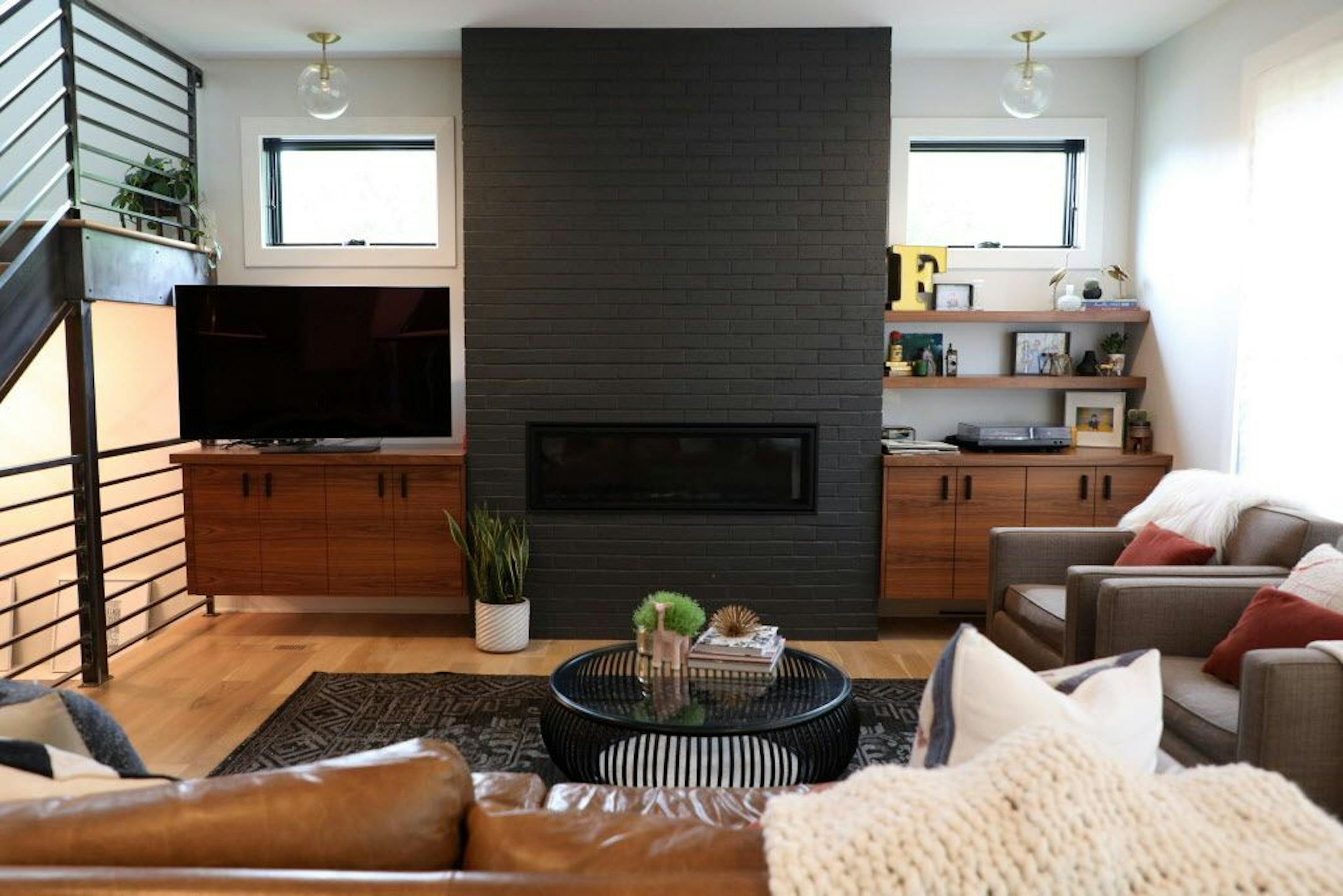 A modern fireplace in the couple's living room.
