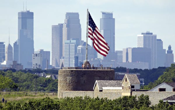 David Brewster/Star Tribune Sunday_06/12/05_Fort Snelling - - - - - Visitors walked below the flag flying above Historic Fort Snelling, downtown Minne